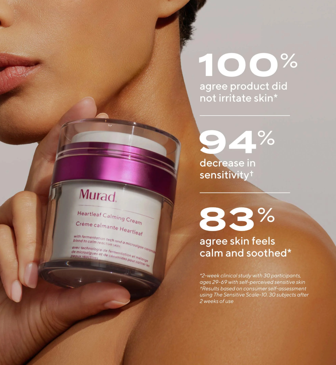 Person holding a jar of Murad Heartleaf Calming Cream with product efficacy statistics on a neutral background.