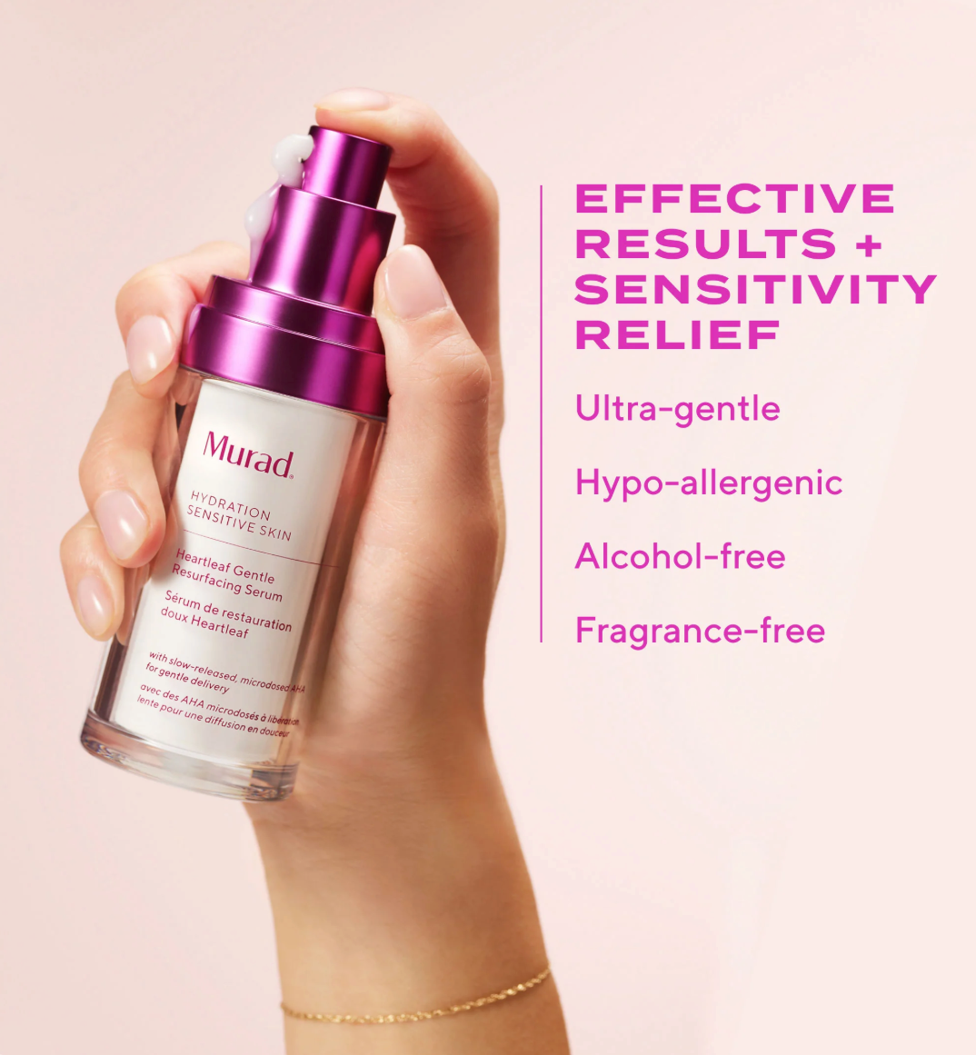 Hand holding a Murad skincare serum with product details on a pink background